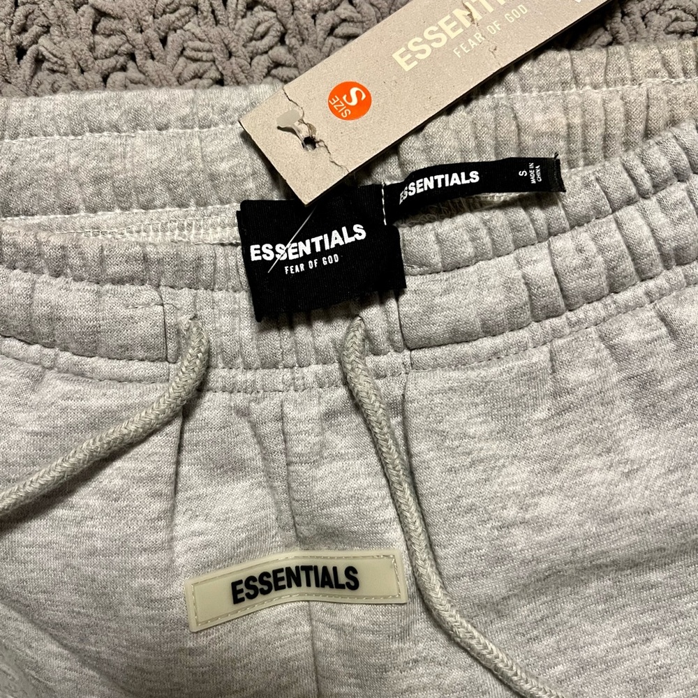 I am selling an Essentials sweat pant in size S that has never been worn.